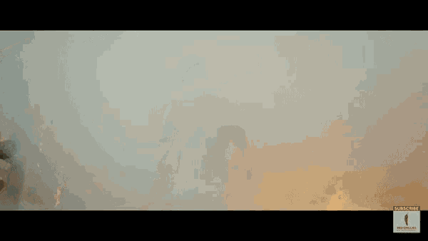 a man holding a gun in a smokey area with a subscribe button