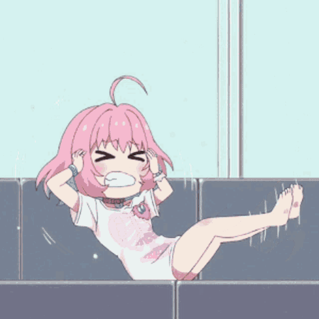a cartoon girl with pink hair is laying on a couch