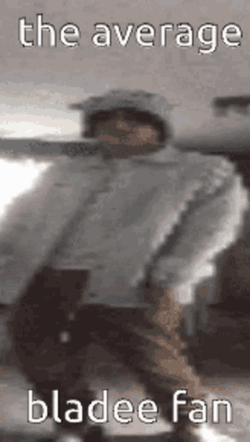 a blurry picture of a man holding a skateboard with the words `` the average bladee fan '' written above him .
