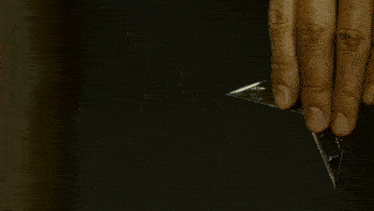 a blurred image of a ninja star flying through the air