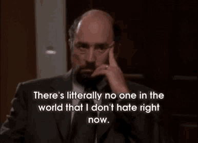 a man in a suit and tie says there 's litterally no one in the world that i don 't hate right now .