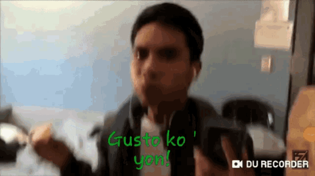a man with gusto ko yon written on the bottom of his face