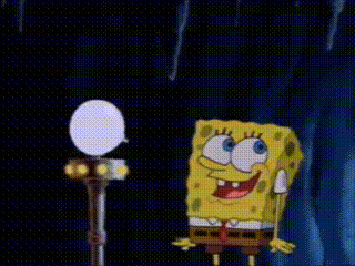 spongebob squarepants is standing next to a microphone and holding a light .