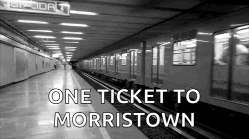 a black and white photo of a subway station with the words one ticket to morristown