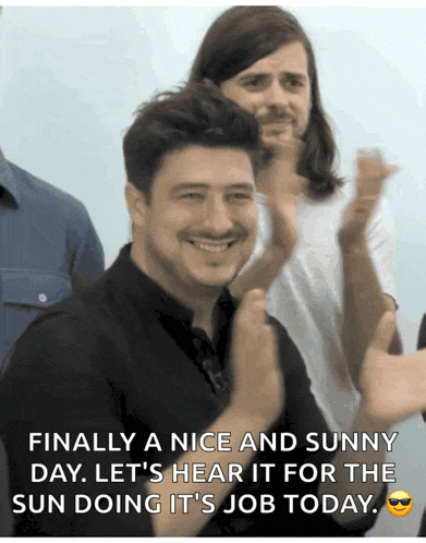 a man with a mustache is smiling with a caption that says finally a nice and sunny day let 's hear it