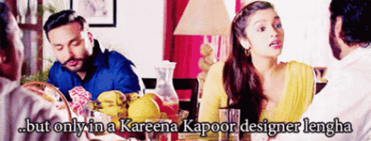 a group of people sitting around a table with the words " but only in a kareena kapoor designer lengha "