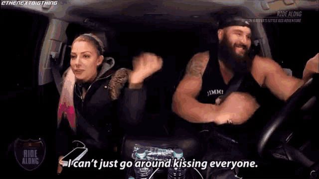a man and a woman are sitting in a car and the woman is saying " i can 't just go around kissing everyone "
