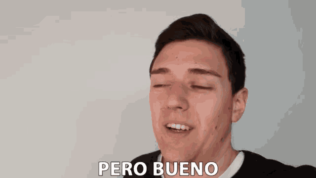 a young man is smiling and says pero bueno