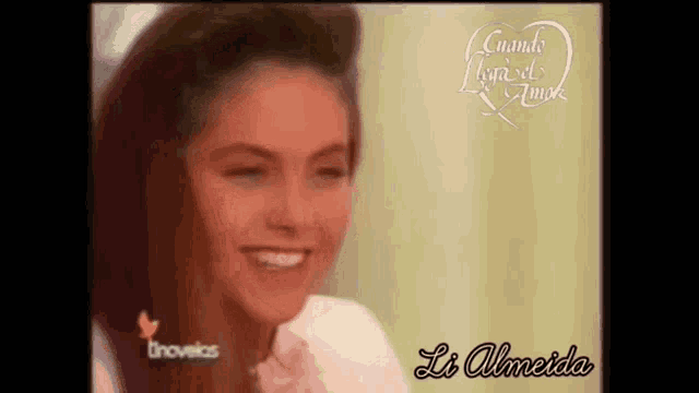 a close up of a woman 's face with the name li almeida on the bottom right