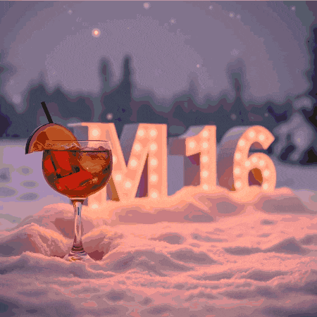 a glass with a straw in it sits in the snow in front of a sign that says m16
