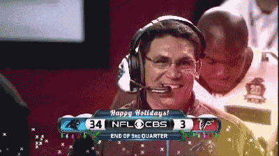 a man wearing headphones and a microphone says " happy holidays "