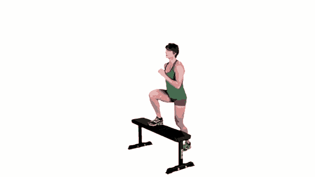 a woman in a green tank top and shorts is doing a workout on a bench