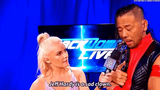 a man and a woman are talking to each other and the woman says jeff hardy is a sad clown .