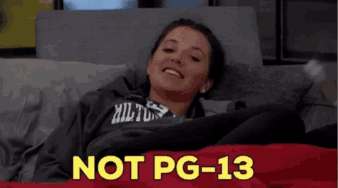a woman laying on a couch with the words not pg-13 written on the bottom