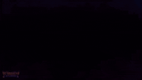 the number four is glowing in the dark on a pink and purple background .
