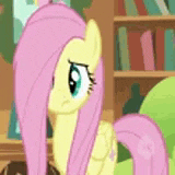 fluttershy from my little pony is standing in front of a bookshelf in a library .