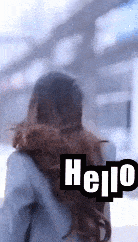 a blurry picture of a woman with the word hello on the bottom right