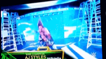 a pixelated image of a wrestling match with the words austyles written on the bottom