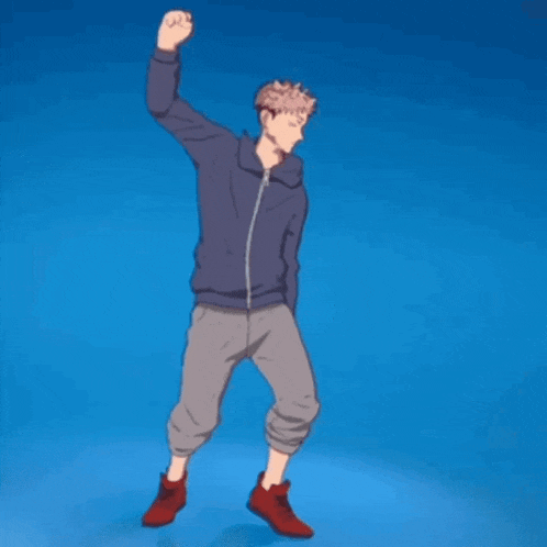 a man in a blue jacket and grey pants is dancing