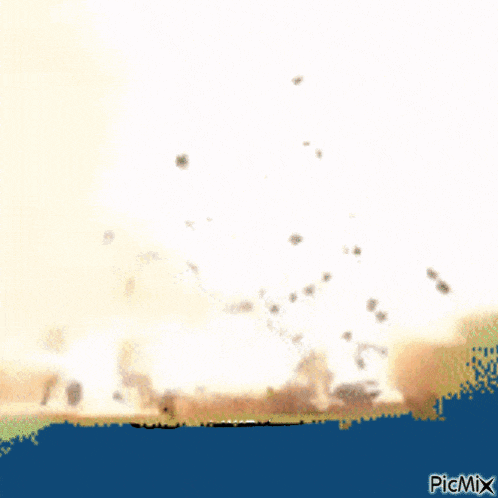 a computer generated image of an explosion with picmix at the bottom right