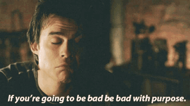 a man with the words if you 're going to be bad be bad with purpose below him