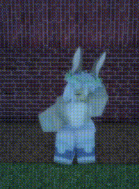 a person is standing in front of a brick wall wearing a bunny costume .