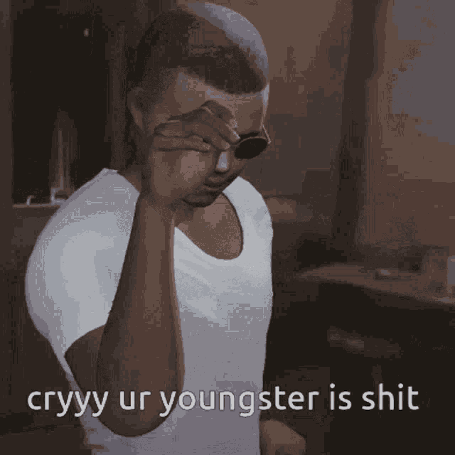 a man wearing sunglasses and a white shirt has the words cryyy ur youngster is shit below him