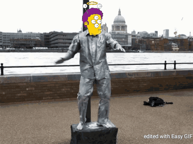 a statue of a man with a cartoon face on it