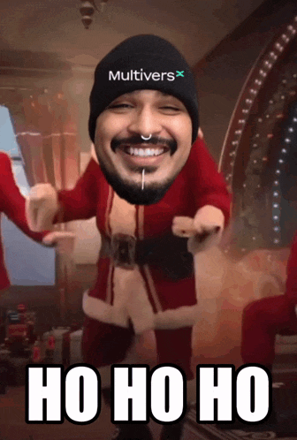 a man in a santa suit is dancing with the words ho ho ho below him
