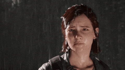 a woman with tears running down her face is wearing a leather jacket