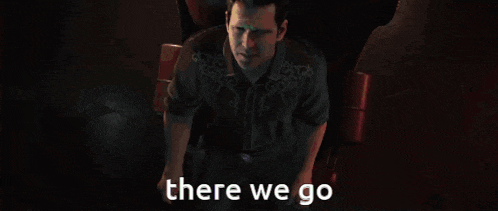 a man is looking up with the words " there we go " below him