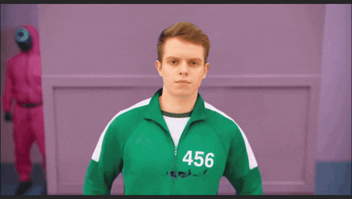 a man in a green uniform with 456 on the back