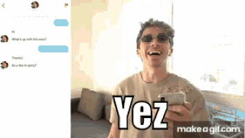 a man wearing sunglasses and a shirt that says yez on it