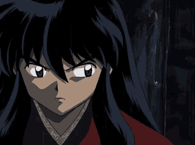 a close up of a cartoon character with long black hair and blue eyes