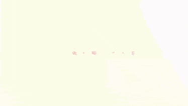 a blurry picture of a crowd of people with the word love in orange letters