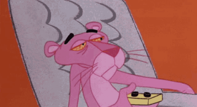 a cartoon of a pink panther laying on a bed