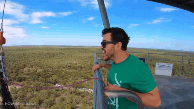 a man in a green shirt with the word how ridiculous on the bottom right