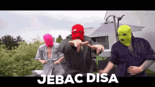 three men wearing ski masks are dancing in front of a trailer and the words jebac disa are above them