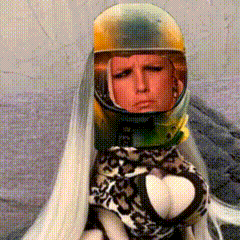 a woman wearing a helmet and a long white cloth
