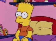 bart simpson is sitting on a bed with a pillow and an alarm clock in the background .