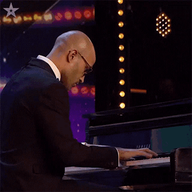 Playing Piano Emmanuel Vass GIF - Playing Piano Emmanuel Vass Britains Got Talent GIFs