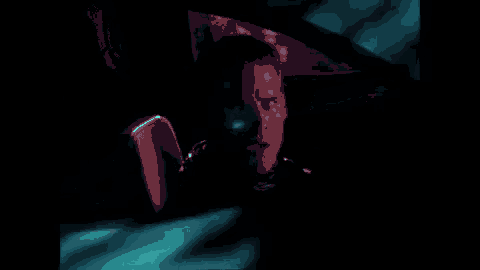 a man is sitting in the driver 's seat of a car .