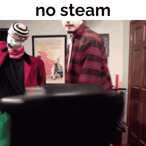 a man in a plaid shirt is standing next to another man in a black shirt with the words " no steam " on the bottom