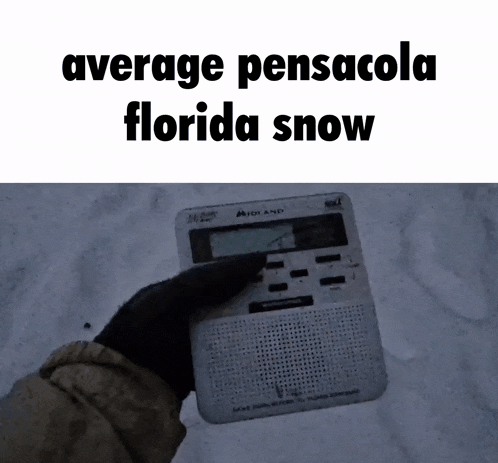 a person is holding a radio in the snow and says average pensacola florida snow