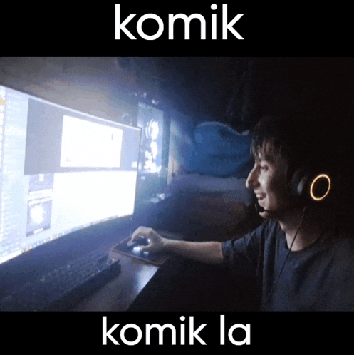 a man wearing headphones is playing a video game on a computer screen that says komik on it