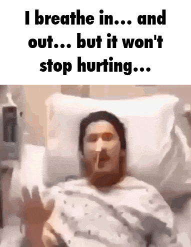 a man is laying in a hospital bed with a cigarette in his mouth