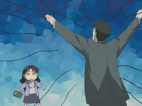 a man and a girl are standing next to each other with their arms outstretched in the wind .