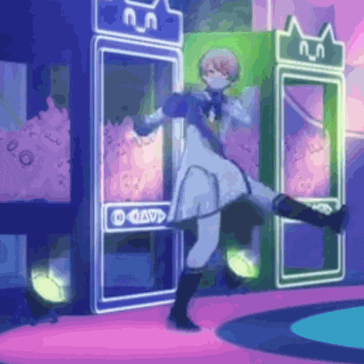a girl in a blue dress is dancing on a stage in front of a telephone booth .