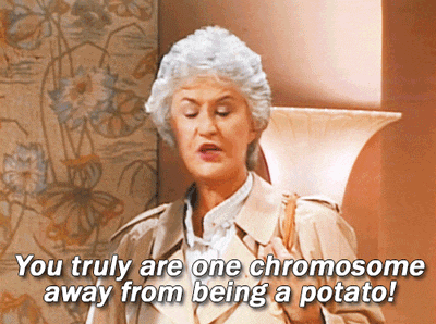 a woman in a trench coat is saying you truly are one chromosome away from being a potato