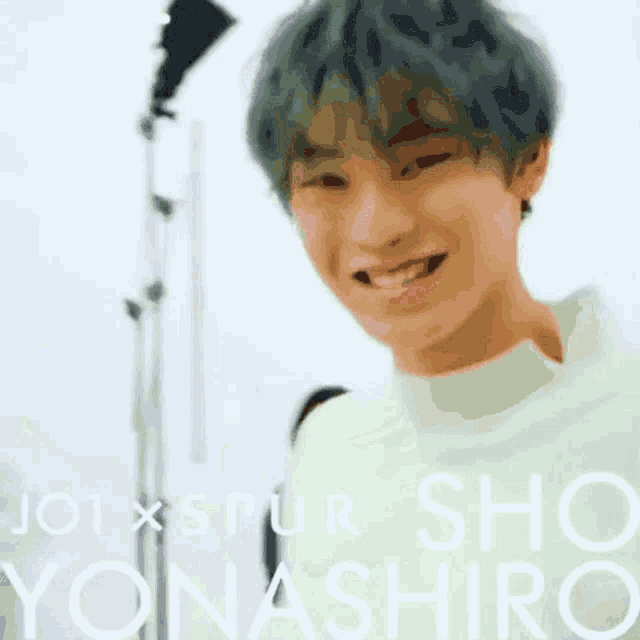 a picture of a young man with the name yonashiro